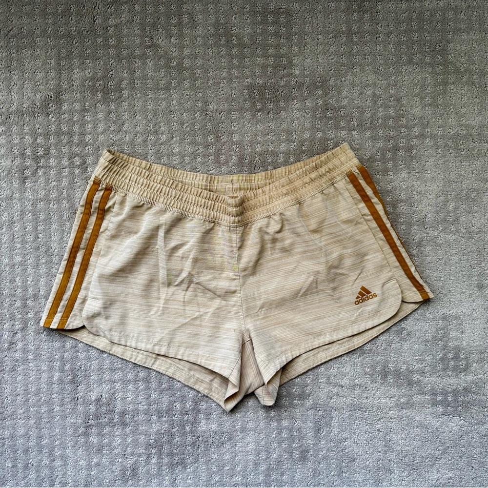 adidas Women's Tan Athletic Shorts with Gold Stripes